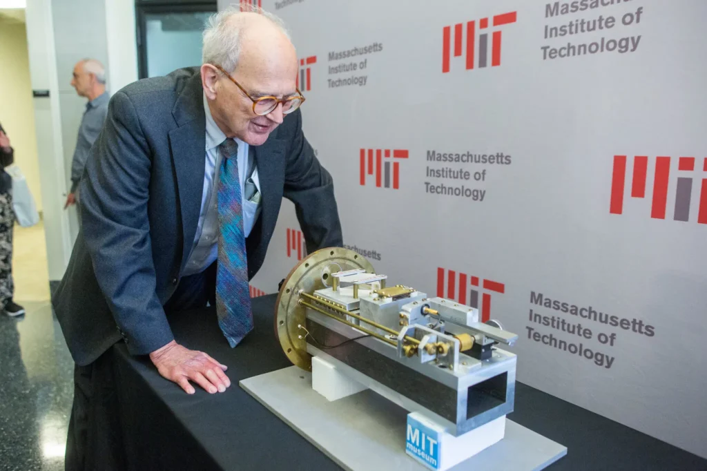 Dr. Weiss with a prototype of the LIGO device that he built in the 1970s.