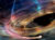 In this artist’s rendering, a stream of matter trails a white dwarf orbiting within the innermost accretion disk surrounding 1ES 1927’s supermassive black hole.