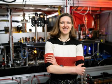 Olivia Rosenstein stands in front of Professor Richard Fletcher