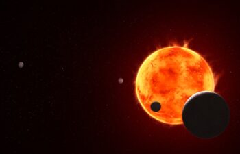 New research using the James Webb Telescope rules out possible atmospheric conditions of the exoplanet TRAPPIST-1e, depicted at the lower right as it transits in front of its host star. While it is still possible for the planet to have an atmosphere, it is unlikely to be a thick, hydrogen-rich one.