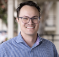 A headshot of Ben Rackman.