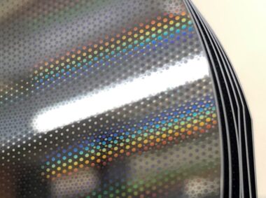 Silicon mirrors with stress correction patterns etched into a thermal oxide layer.